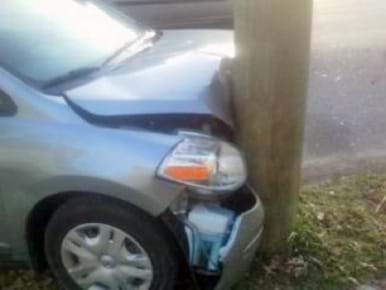 Car Hitting Power Pole